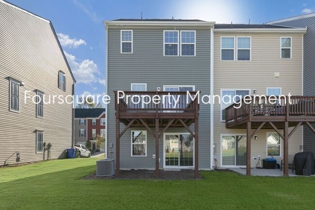 Building Photo - Townhome | 2nd Floor Back Deck| One Car Ga...