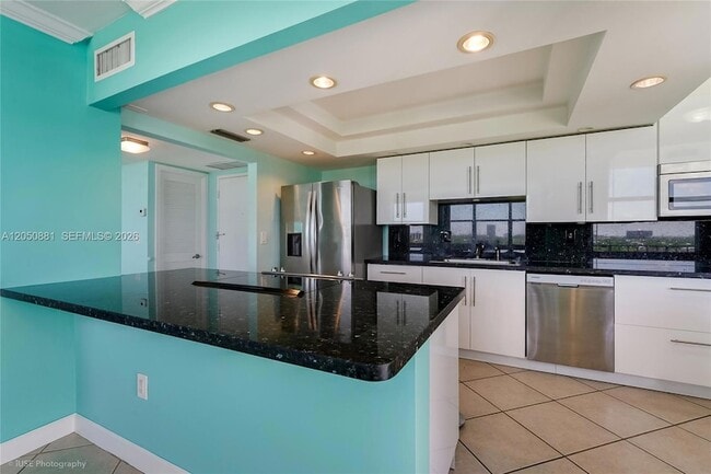 Photo - 11930 N Bayshore Drive Unit 909 Apartment