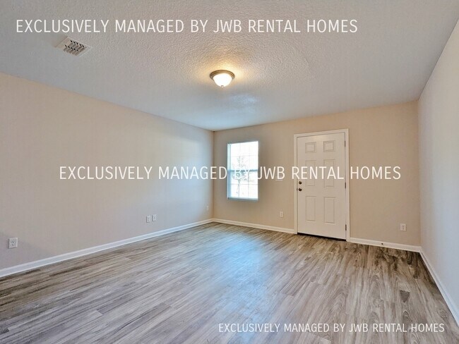 Building Photo - 8503 McGirts Village Ln