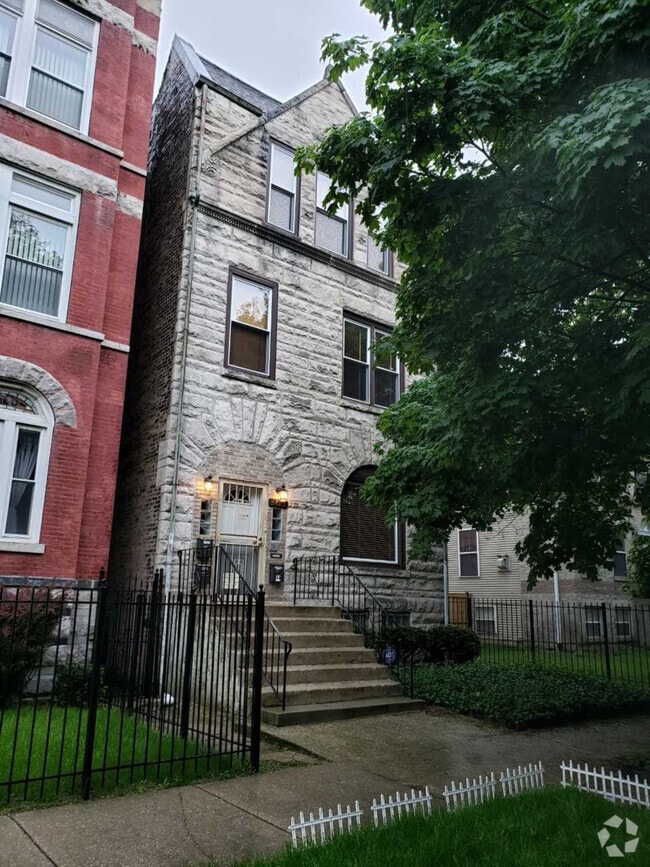 Building Photo - 4823 S Langley Ave