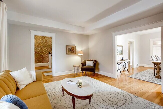 Building Photo - "Charming 4-Bed Oasis with 2.5 Baths in the Heart of Denver – 1768 Sq Ft of Comfort!"