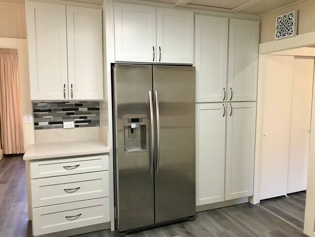 Foto del edificio - Punchbowl area Single family 3/1.5/1 car carport