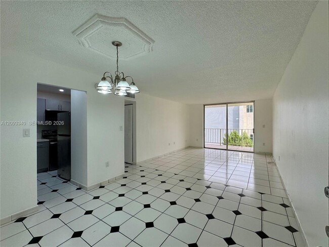 Building Photo - 4675 W 18th Ct
