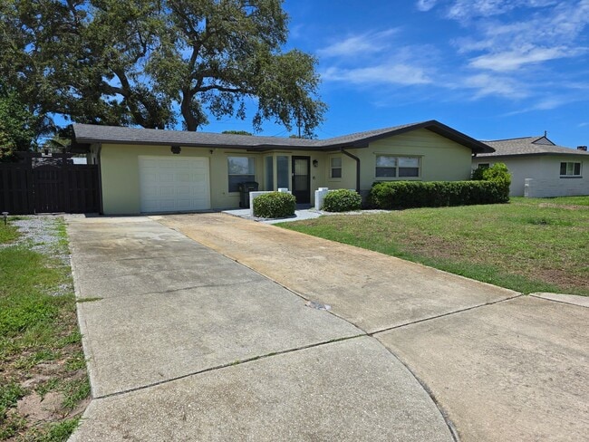 Building Photo - Live the Florida Lifestyle – Turnkey 2BR H...