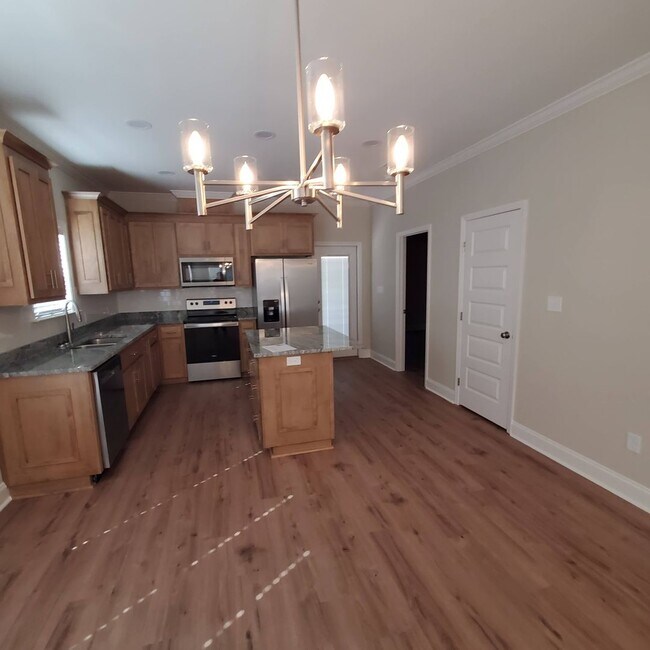 Building Photo - New 3/2 Home with Granite Countertops, Sta...