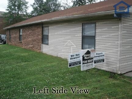 Building Photo - Your Charming Comfortable Home