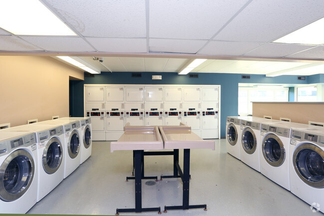 Laundry Room - Whispering Oaks Apartments