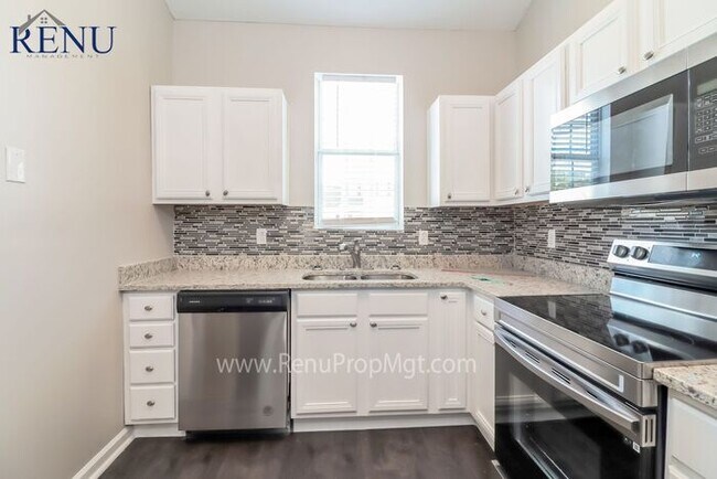 Building Photo - Available Now!