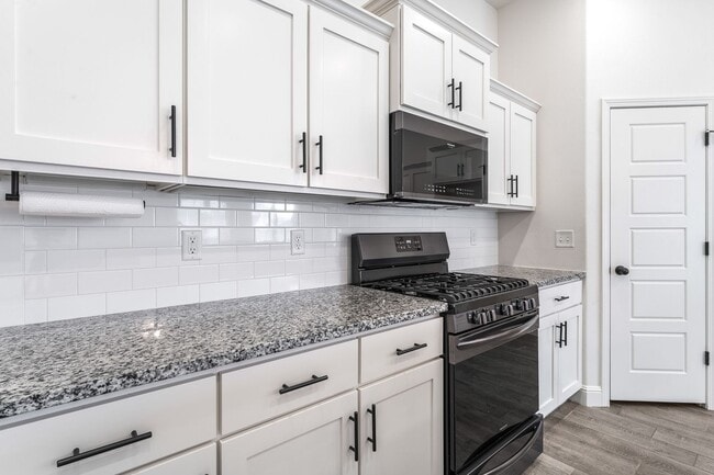 Building Photo - This home truly combines comfort, style, and convenience