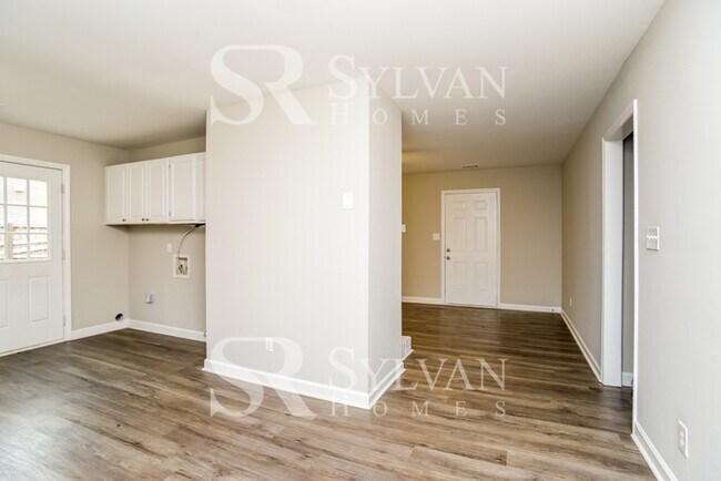 Building Photo - You'll love this charming brick home!