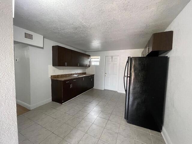 Building Photo - 2840 AVENUE S Unit A