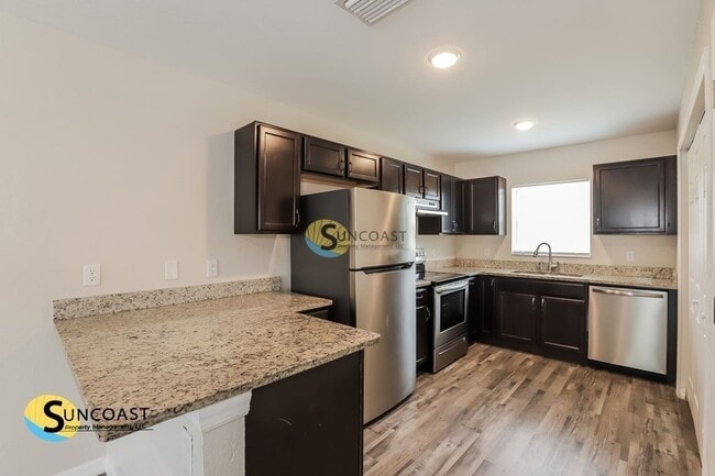 Building Photo - 9021 N Travis Dr
