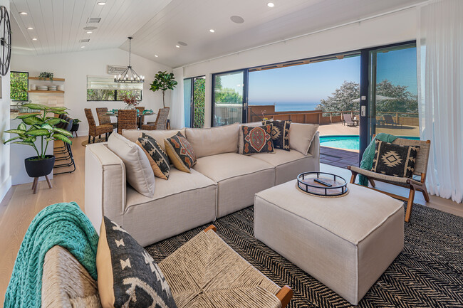 living room dining Fleetwood door to pool - 225 Notteargenta Rd