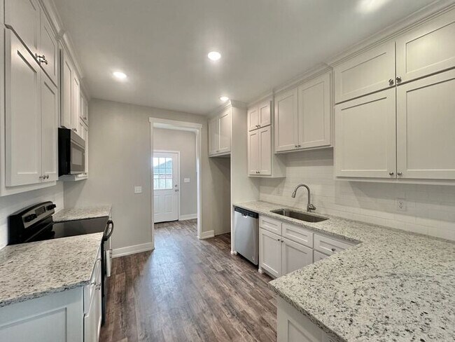 Building Photo - Available Now! New Construction 3 Bed 2 Ba...