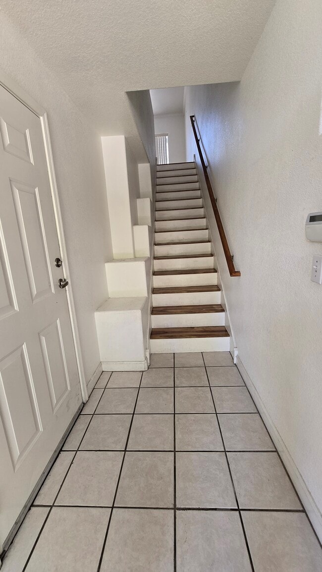 Stairs to Main Floor - 4465 E Paradise Village Pkwy S APT 1129