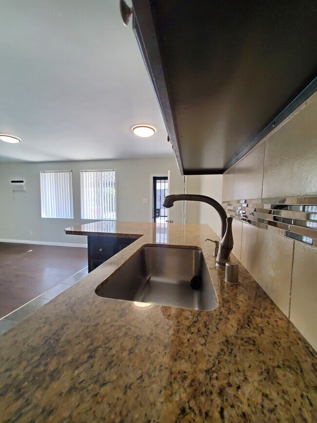Clean modern kitchen new appliances - 673 W Wilson Ave