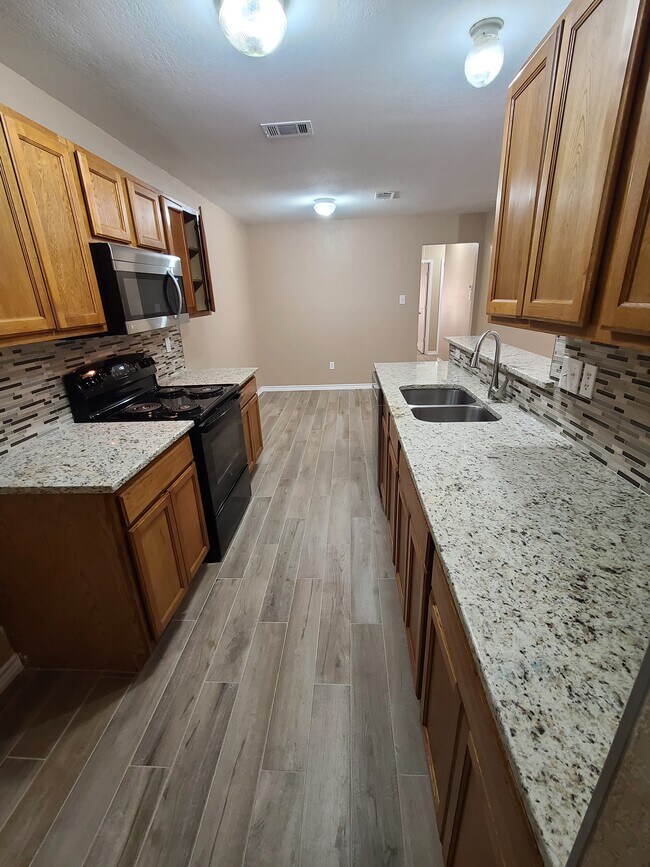 Building Photo - 8015 Julie Ave