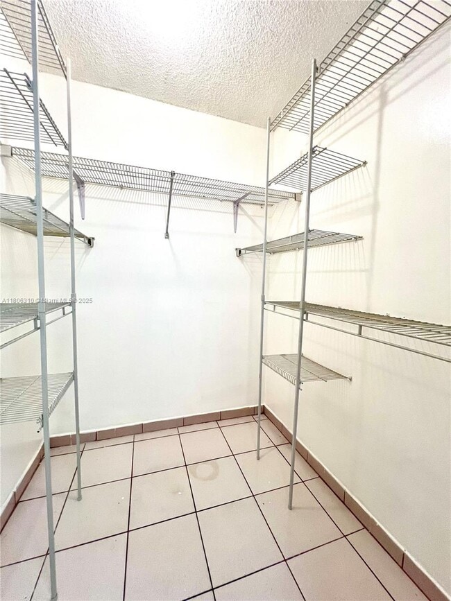 Building Photo - 4675 W 18th Ct