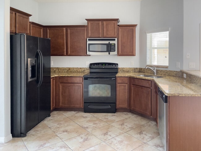 Foto del edificio - 4140 Shade Tree Ln