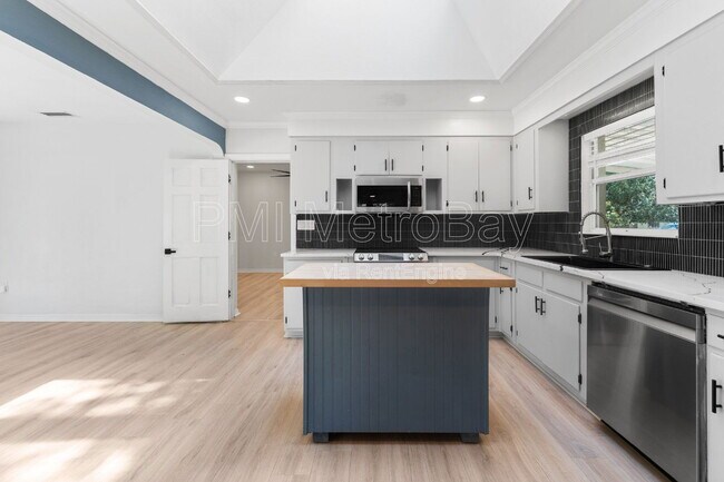 Foto del edificio - 4939 Woodland Dr