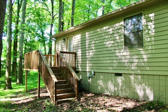 Back exterior of home - 8212 S Lowell Rd