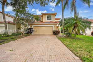 Photo - 3884 Northwest 63rd Terrace, Coral Springs, FL 33067 - 3 BR 2.5 BA Single-Family Home