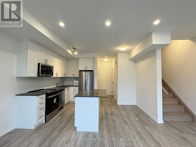 Photo du bâtiment - 15 Lytham Grn Cir