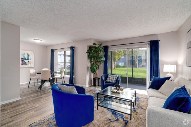 2BR, 2BA - 955SF - Living Room - Royal Isles Apartments