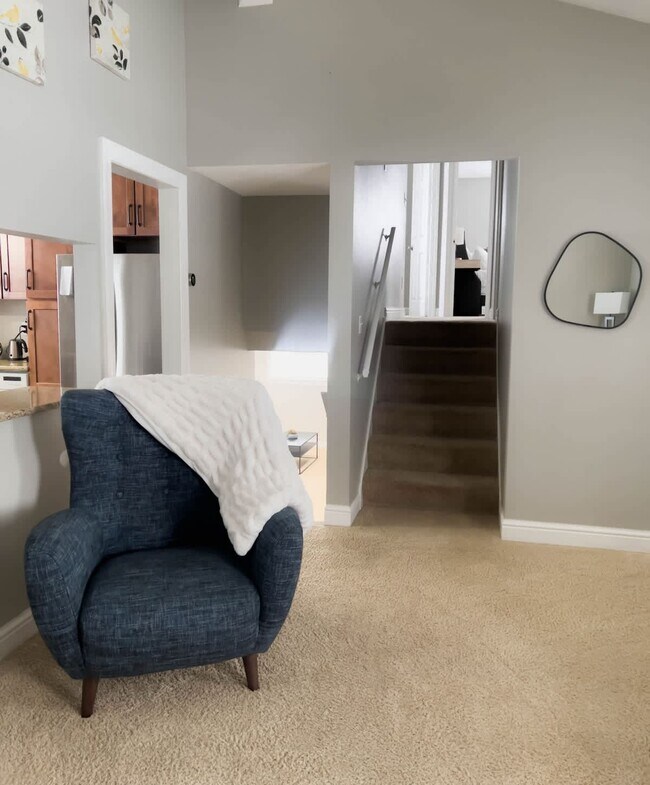 Main living floor showing the 5 stairs leading to the upstairs bedrooms. - 1237 Giesse Dr