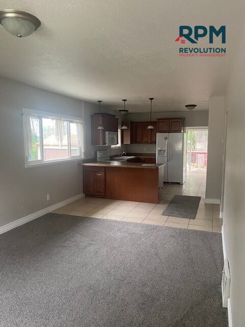 Foto del edificio - "Charming 4-Bed, 2-Bath Gem in Ogden"