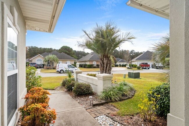 Building Photo - Live the Coastal Lifestyle in This Cypress Keys Beauty!