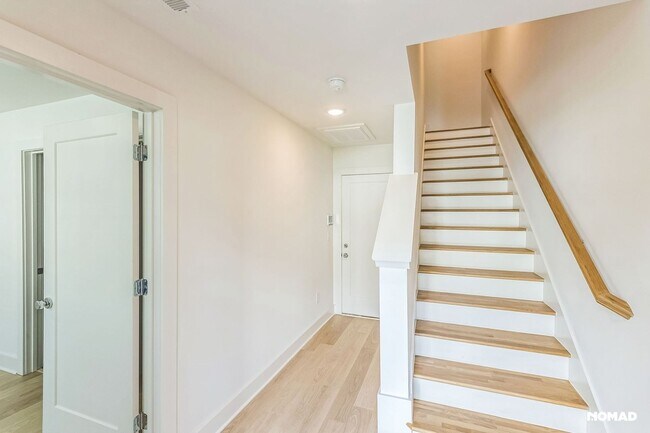Building Photo - Brand New Home three-story townhome offers...