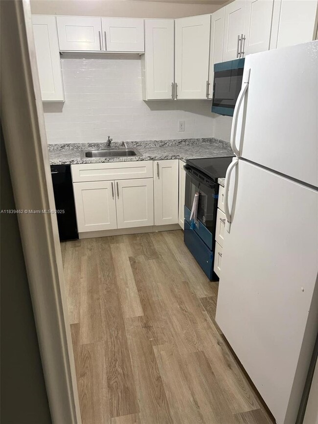 Building Photo - 22615 SW 66th Ave