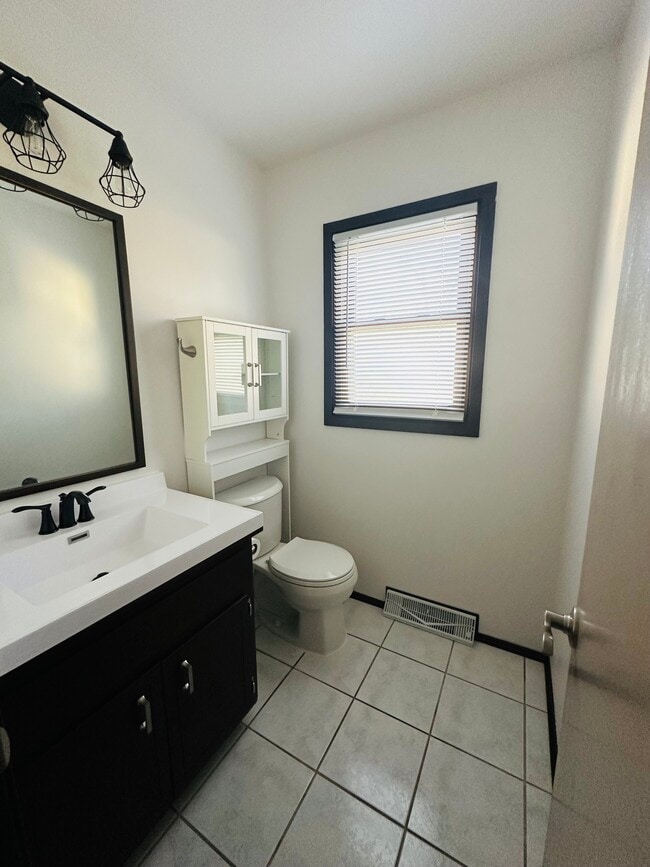 Half bath on main level - 3202 W Alvina Ave