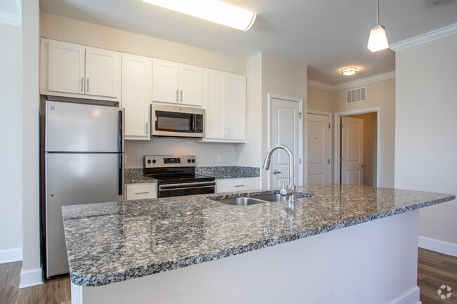 1BR, 1.5BA - 940SF - Kitchen - The Preserve at Carteret Place