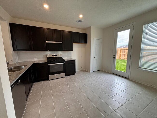 Foto del edificio - 15703 Lemmonwood Hls Ln