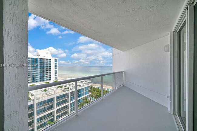 Building Photo - 6767 Collins Ave
