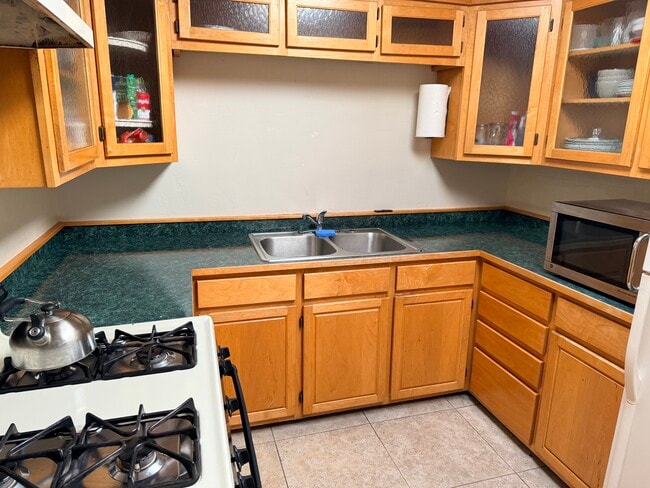 Kitchen with beautiful maple cabinets - 491 E Juniper Dr