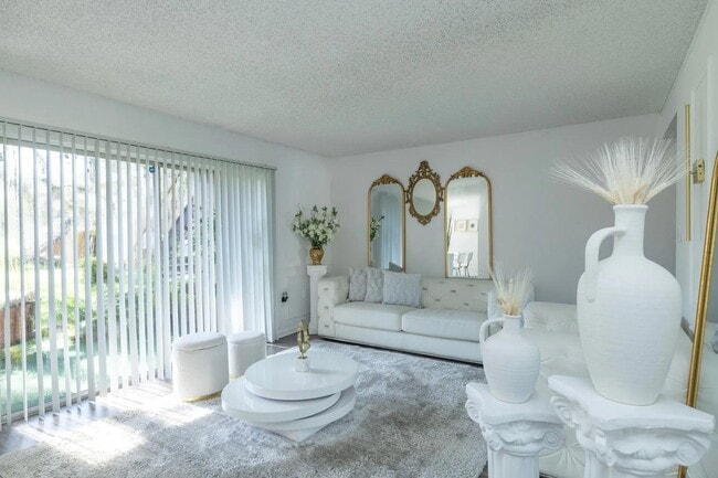 Área de estar - Parc Place Villas Apartments