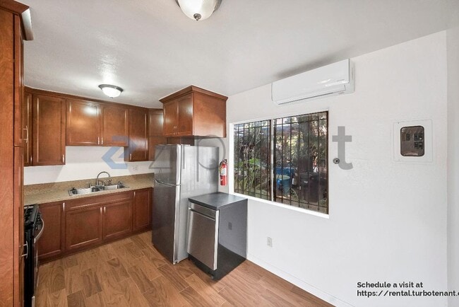 Building Photo - 2458 Normandie Ave