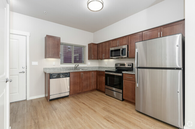 2BR, 2BA - 940SF Kitchen - 56 Commons Apartments