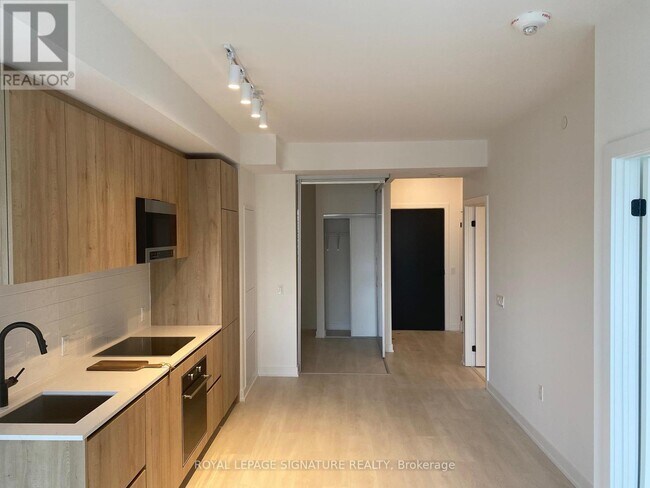 Photo du bâtiment - 117 Broadway Ave