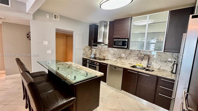 Building Photo - 19390 Collins Ave