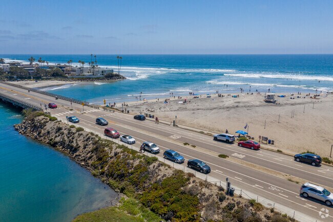 Aerial street parking leading into parts of Del Mar Beaches by the shroe.