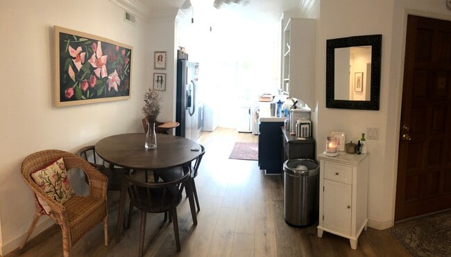 The eating area is situated between the family room nd kitchen. - 23705 Sea Breeze Ln