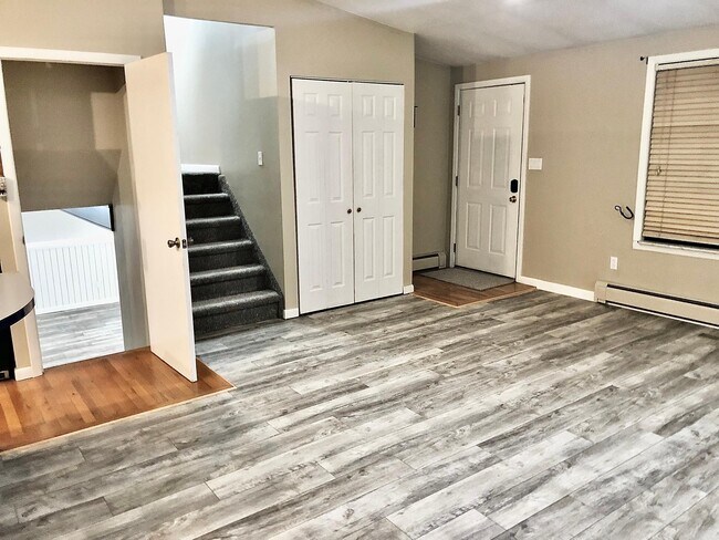 1st floor living room/kitchen (door open to basement) - 1128 1st Ave