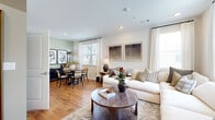 Located at 629 Saybrook Ct in Exton, PA, this well-appointed one-bedroom, one-bathroom residence offers a smart, efficient layout across a single floor. Warm hardwood-style flooring runs throughout the main living areas, anchoring a bright and cohesive design aesthetic.

The open-concept living and dining area is filled with natural light from multiple windows dressed with white curtains and blinds. The living space features recessed lighting and a neutral color palette, while the dining nook is accented by a sage green wall, creating a subtle yet distinct character. Both areas flow seamlessly together, making the space feel open and connected.

The galley-style kitchen is well-equipped with white shaker cabinetry, quartz countertops, a subway tile backsplash, and a full suite of stainless steel appliances including a gas range, microwave, refrigerator, and dishwasher.

The bedroom is a comfortable retreat, featuring plush carpeting, two windows that invite ample natural light, and access to a dedicated closet. The bathroom is clean and modern, appointed with a white vanity, quartz countertop, a large mirror, and a glass-enclosed walk-in shower with white tile surround and built-in shelving. Neutral tile flooring completes the polished look of this well-designed residence.