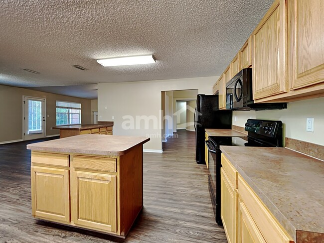 Foto del edificio - 9651 Walton Oaks Ln