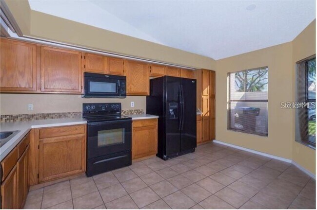 Building Photo - 12130 Augusta Woods Cir