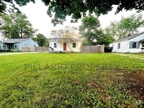 Building Photo - 1415 N Luett Ave